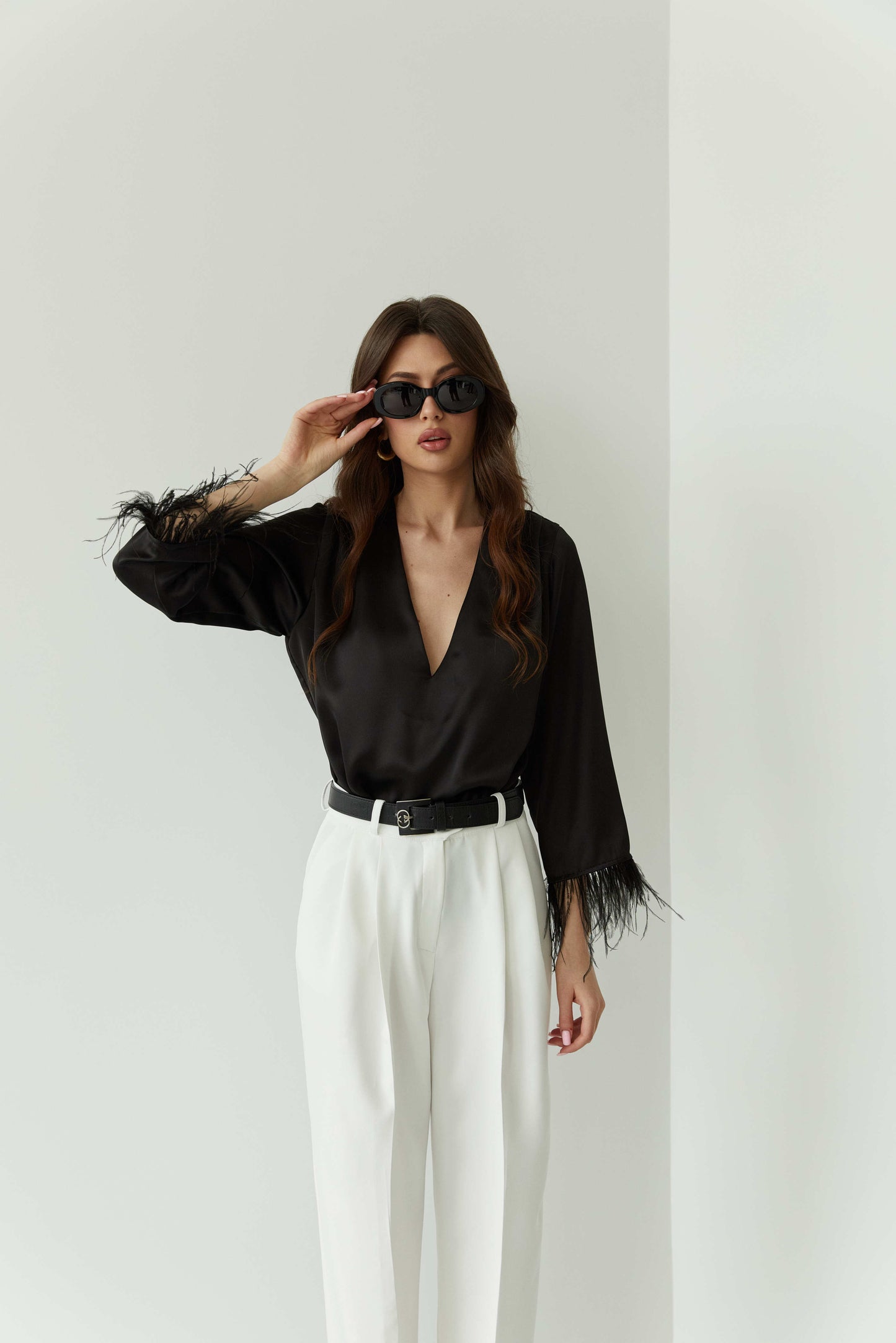 Silk feathered blouse in Black